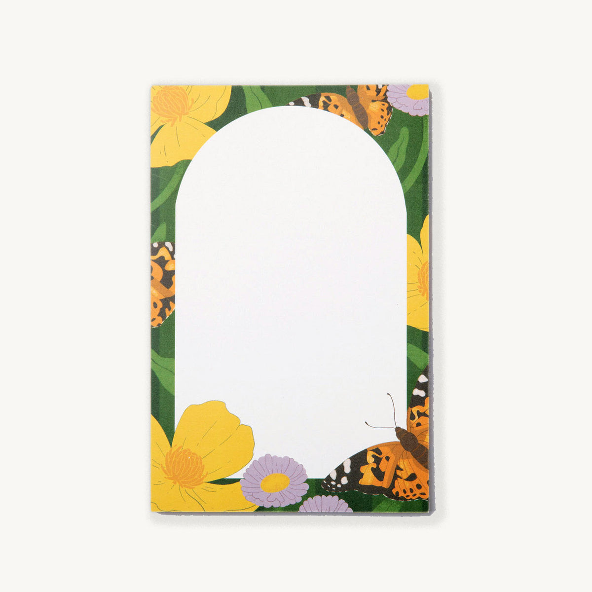 Notepad with floral and butterfly design on a white background