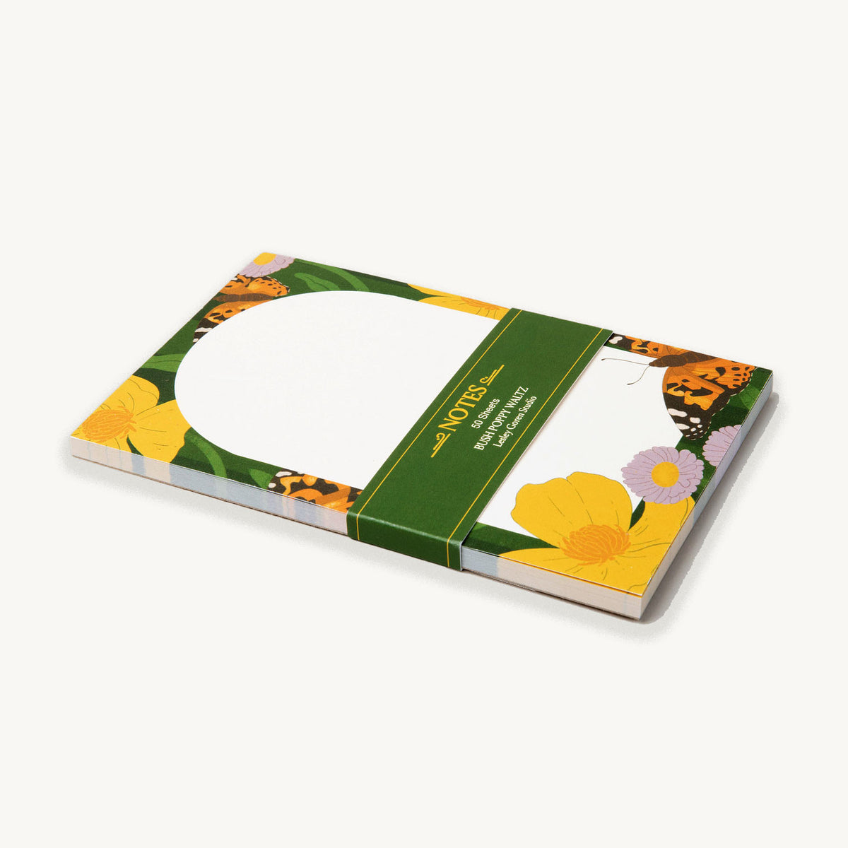 Notepad with butterflies floral design on a white background